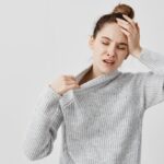 exhausted-girl-holding-her-head-with-closed-eyes-being-hot-female-office-ass