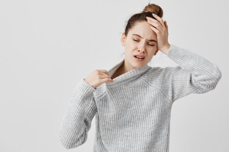 exhausted-girl-holding-her-head-with-closed-eyes-being-hot-female-office-ass